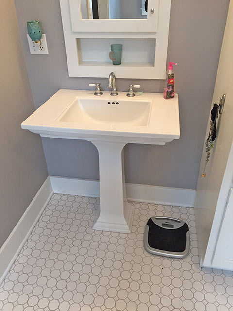 New Pedesatal sink installed in remodeling project.