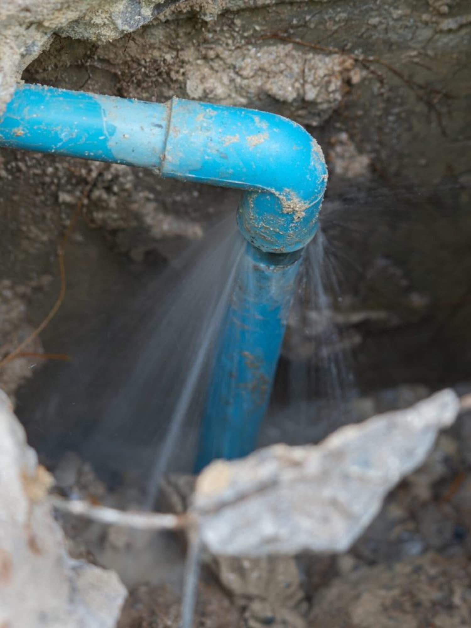 Leaking underground water line exposed for repair